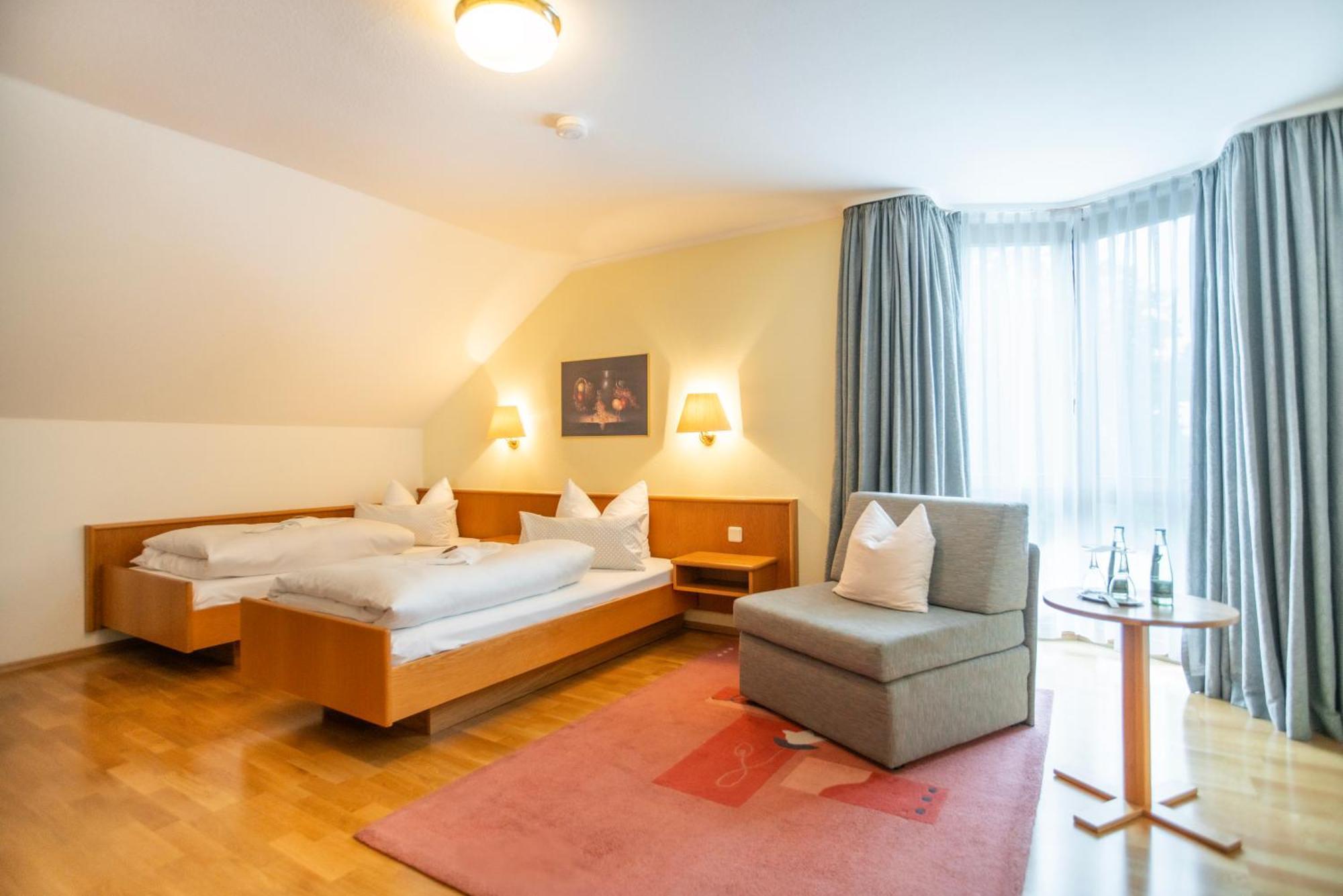 Doppel- oder Zweibettzimmer